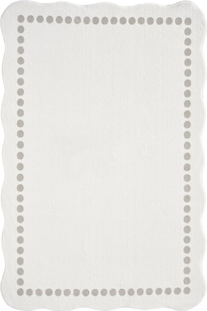 Cream · Scallop Edge Rug — overhead view of the full rug